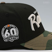 OAKLAND RAIDERS 60TH ANNIVERSARY RETRO SCRIPT GITD WOODLAND CAMO NEW ERA FITTED CAP