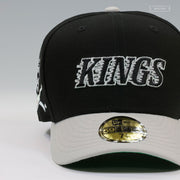 LOS ANGELES KINGS HOCKEY MASK AND CROSSED HOCKEY STICKS WORDMARK NEW ERA FITTED CAP