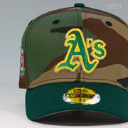 OAKLAND ATHLETICS 1987 MLB ALL-STAR GAME WOODLAND. CAMO GRADATED NEW ERA FITTED CAP