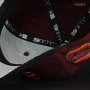 BUFFALO BISONS SLIDING BISON INTENSE MAROON AND INFRARED BLISS NEW ERA FITTED CAP