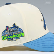 ST. LOUIS CARDINALS 2006 WORLD SERIES CHAMPIONS OFF WHITE ULTRA BLUE NEW ERA FITTED CAP